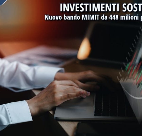 Imprenditore al computer con grafici digitali in sovrimpressione, immagine rappresentativa del bando “Investimenti sostenibili 4.0” del MIMIT dedicato alle PMI del Sud Italia.