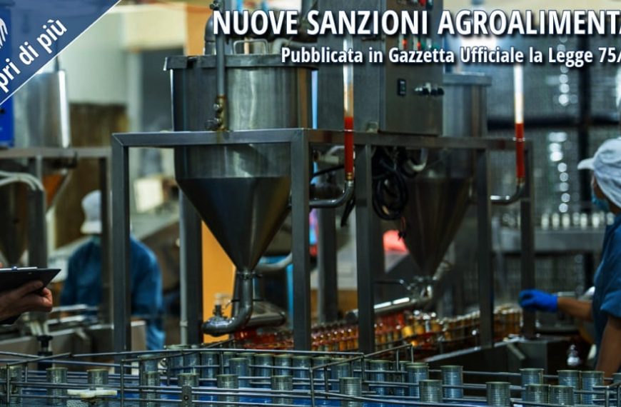 Impianto industriale agroalimentare con operatori al lavoro e controlli di produzione, immagine relativa alle nuove sanzioni agroalimentari introdotte dalla Legge 75/2026.