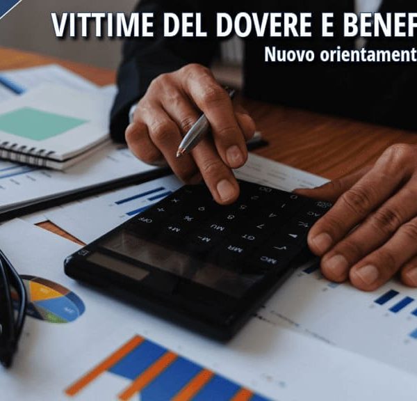 Operatore utilizza una calcolatrice per il calcolo delle imposte. L'immagine richiama il nuovo orientamento INPS sui benefici fiscali e sull'esenzione IRPEF per le vittime del dovere.